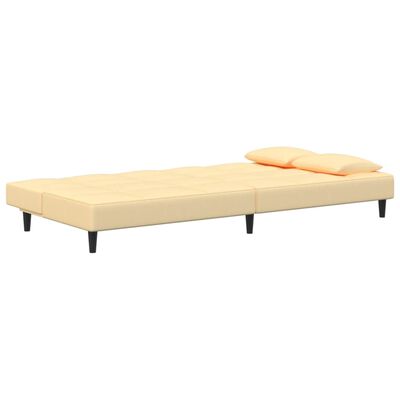 vidaXL Dvivietė sofa-lova su dvejomis pagalvėmis, kreminė, aksomas