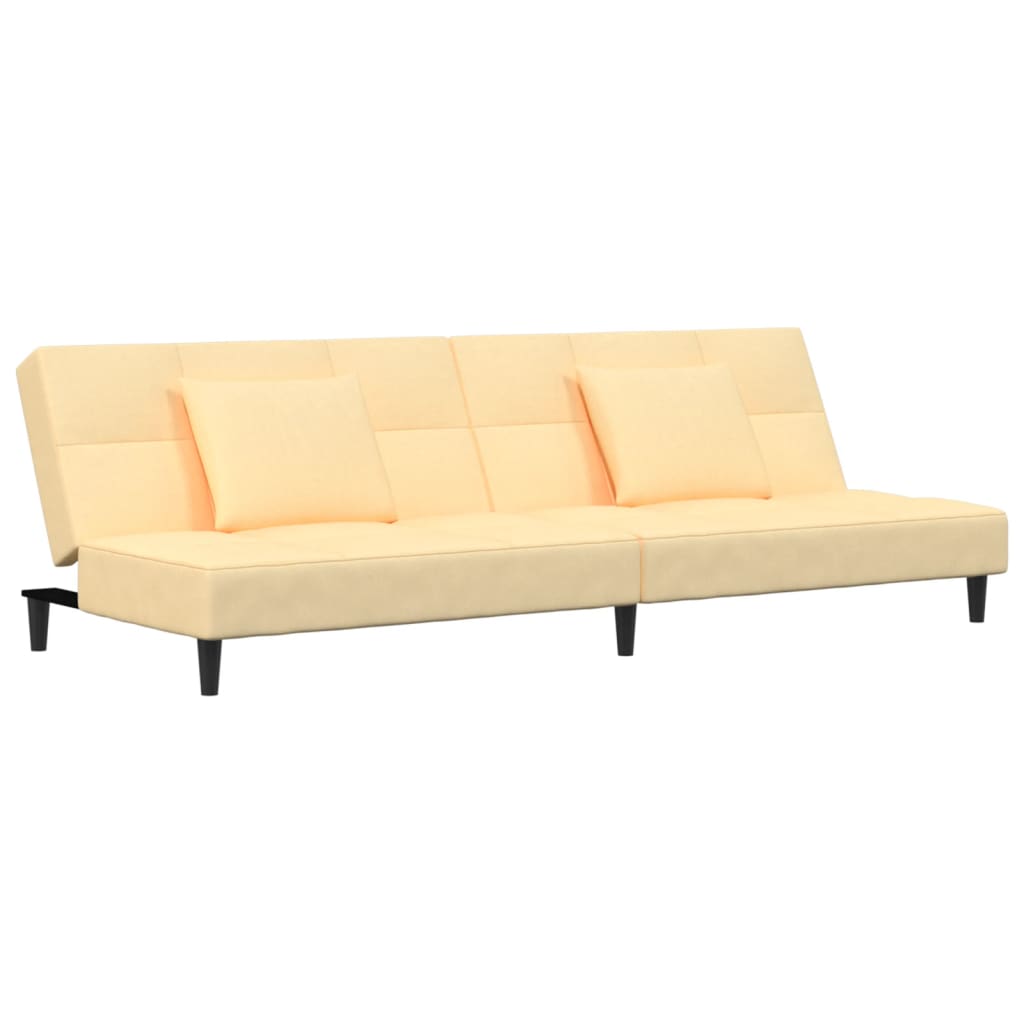 vidaXL Dvivietė sofa-lova su dvejomis pagalvėmis, kreminė, aksomas